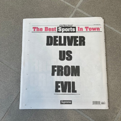 Supreme New York Post Newspaper “Late City Final Edition” from Fall/Winter 2026, released on August 17th, 2026. Features the features a religious statue with iconic Supreme box logo printed on it. On the back there's a "Deliver US From Evil". Includes the full original newspaper, with only the cover designed by Supreme.