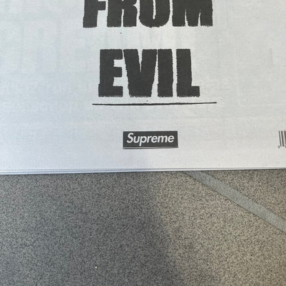 Supreme New York Post Newspaper “Metro Edition” from Fall/Winter 2026, released on August 17th, 2026. Features the features a religious statue with iconic Supreme box logo printed on it. On the back there's a "Deliver US From Evil". Includes the full original newspaper, with only the cover designed by Supreme.