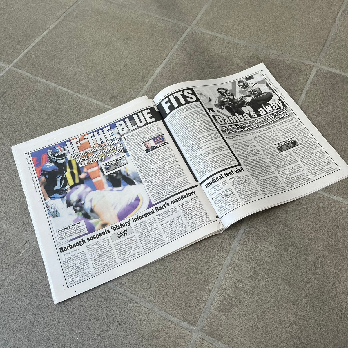 Supreme New York Post Newspaper “Metro Edition” from Fall/Winter 2026, released on August 17th, 2026. Features the features a religious statue with iconic Supreme box logo printed on it. On the back there's a "Deliver US From Evil". Includes the full original newspaper, with only the cover designed by Supreme.