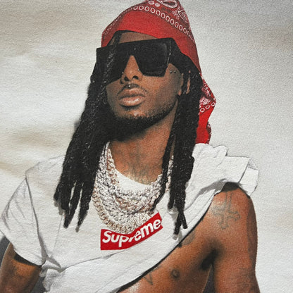 Supreme Playboi Carti photo tee in white from the FW25 collection, featuring a large front print of the influential rapper. Crafted from soft cotton, it merges Supreme’s iconic photo tee format with Carti’s distinct cultural presence.