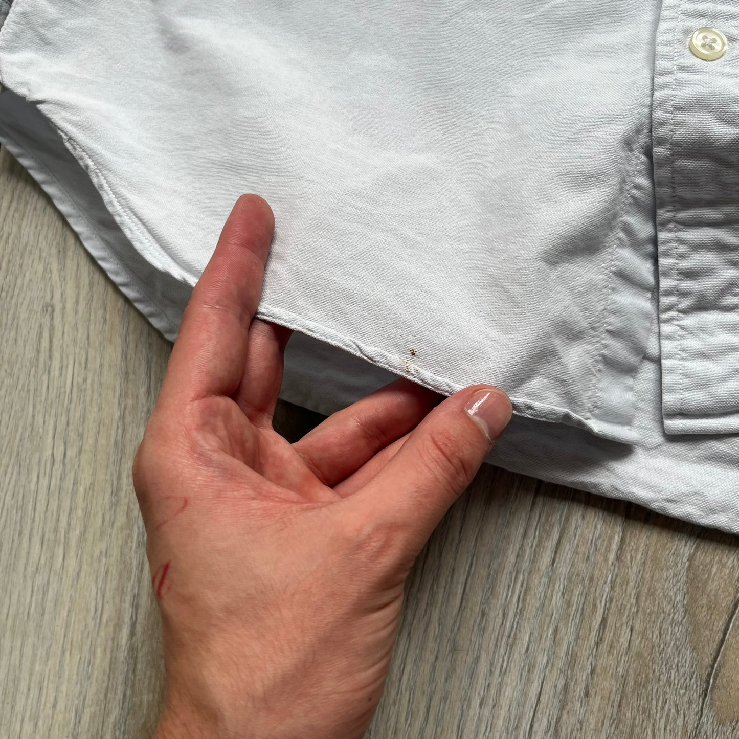 Supreme SS19 Oxford Shirt is a light blue button-up shirt from the Spring/Summer 2019 collection, released on February 21, 2019. It features a button-front closure, a standard collar, and a single chest pocket with a small Supreme tag attached to the side.