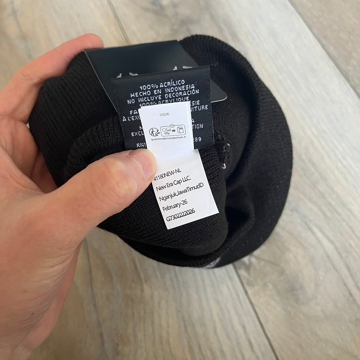 Supreme SS26 New Era Ghostface Black Beanie is a black knit beanie released on March 26, 2026, as part of the Spring/Summer 2026 collection. The front features a white Ghostface graphic, while the back includes “Supreme” text in a gothic-style font, with a small New Era logo embroidered on the side. The beanie is constructed from knit fabric for warmth and everyday wear.