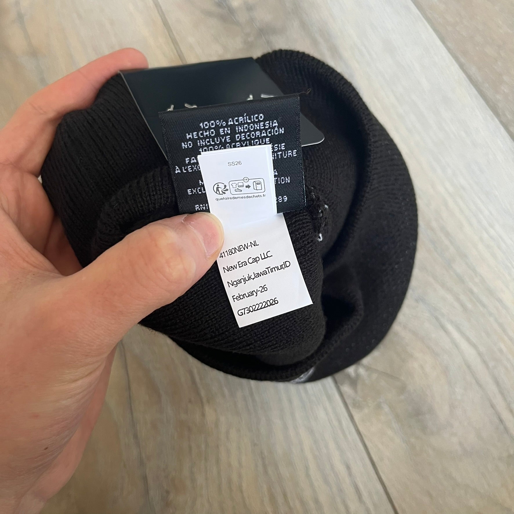 Supreme SS26 New Era Ghostface Black Beanie is a black knit beanie released on March 26, 2026, as part of the Spring/Summer 2026 collection. The front features a white Ghostface graphic, while the back includes “Supreme” text in a gothic-style font, with a small New Era logo embroidered on the side. The beanie is constructed from knit fabric for warmth and everyday wear.