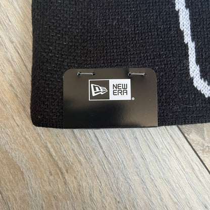 Supreme SS26 New Era Ghostface Black Beanie is a black knit beanie released on March 26, 2026, as part of the Spring/Summer 2026 collection. The front features a white Ghostface graphic, while the back includes “Supreme” text in a gothic-style font, with a small New Era logo embroidered on the side. The beanie is constructed from knit fabric for warmth and everyday wear.