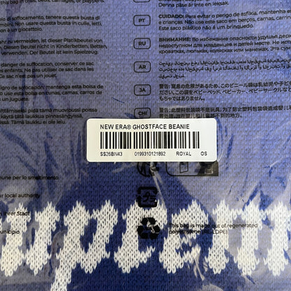 Supreme SS26 New Era Ghostface Black Beanie is a Royal (Blue) knit beanie released on March 26, 2026, as part of the Spring/Summer 2026 collection. The front features a white and black Ghostface graphic, while the back includes “Supreme” text in a gothic-style font, with a small New Era logo embroidered on the side. The beanie is constructed from knit fabric for warmth and everyday wear.