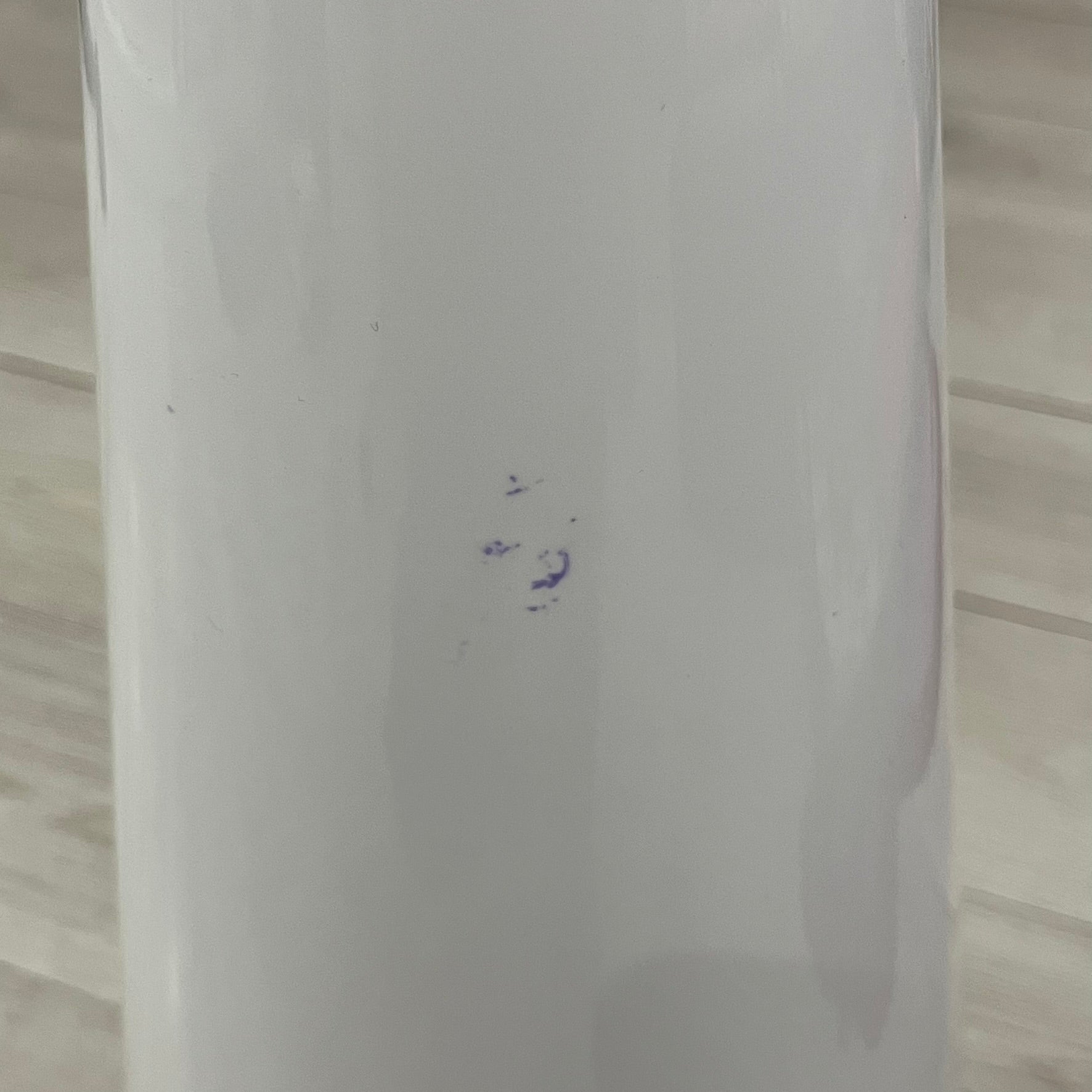 The Supreme Traffic Cone FW25 White features a clean white PVC body with a classic red Supreme box logo on the lower front. Designed for display purposes only, it sits on a black base and is not intended for use as a functional traffic marker. Released on October 16, 2025.