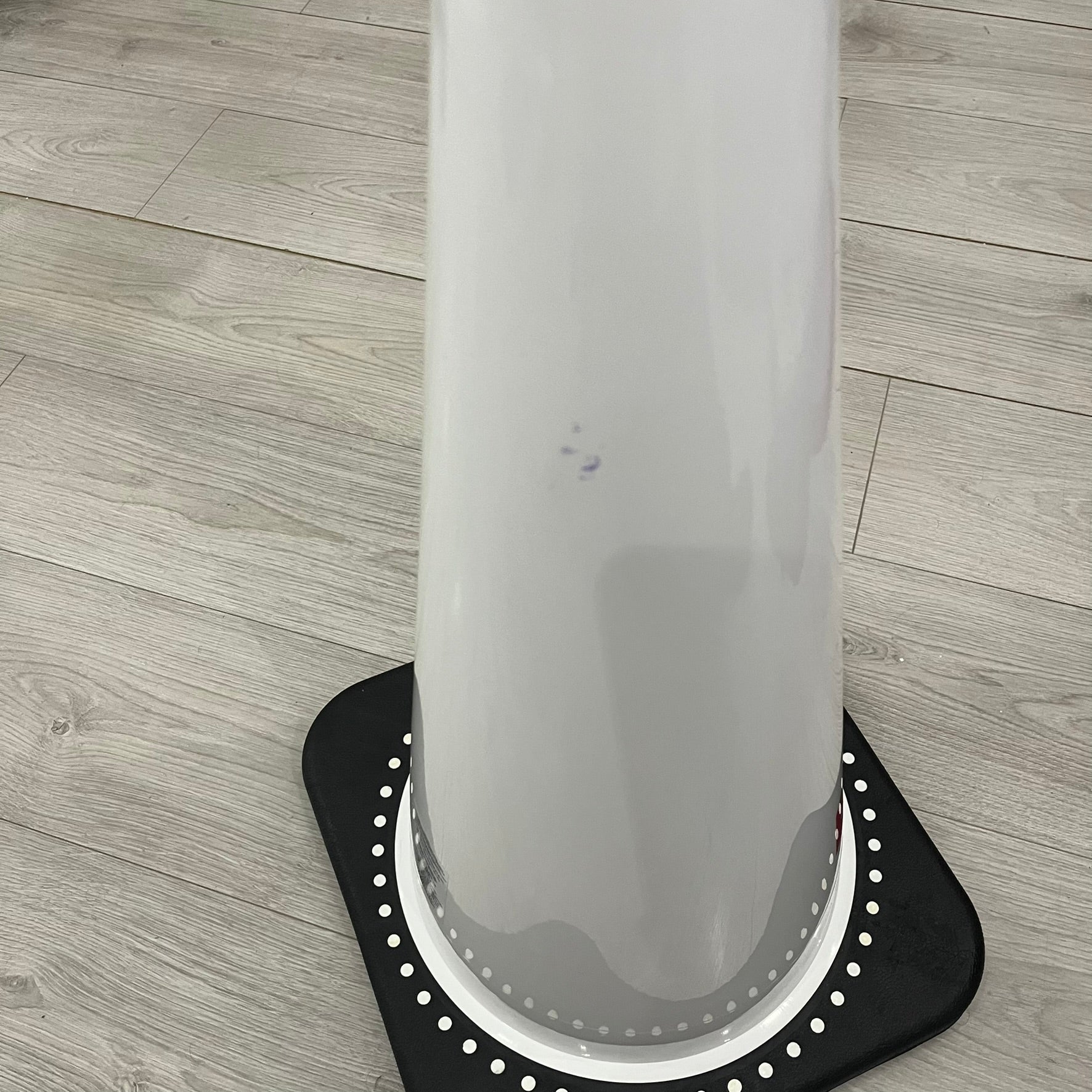 The Supreme Traffic Cone FW25 White features a clean white PVC body with a classic red Supreme box logo on the lower front. Designed for display purposes only, it sits on a black base and is not intended for use as a functional traffic marker. Released on October 16, 2025.