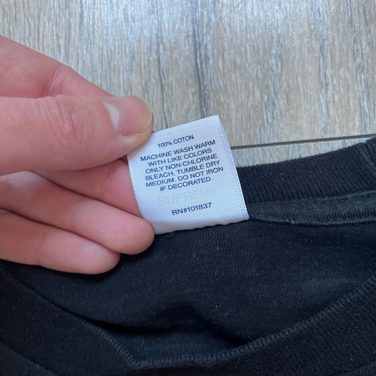 Supreme Undercover Public Enemy Counterattack SS18 Longsleeve Tee is a black long-sleeve T-shirt released on March 15, 2018, crafted from 100% cotton. The front features white “The Counterattack On World Supremacy” text with a small Supreme UNDERCOVER logo beneath, while the back displays a large Public Enemy “Fear of a Black Planet” graphic with galaxy and planet imagery and the same co-branded logo below. The design includes a ribbed crewneck and ribbed cuffs, reflecting the SS18 collaboration between Sup