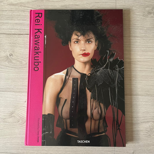 Taschen Terry Jones: Rei Kawakubo hardcover book offers an in-depth look at the visionary designer behind Comme des Garçons, exploring her groundbreaking approach that spans fashion, furniture, architecture, and graphic design. Drawing from i-D magazine archives, it revisits interviews and features that highlight Kawakubo’s challenge to conventional ideas of body shape and garment construction, blending fashion with conceptual art. Spanning 120 pages, the book includes biographical insights, rare imagery by