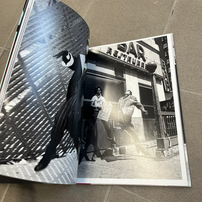 Taschen *Yohji Yamamoto* Hardcover Book is a hardcover publication curated by Terry Jones, exploring the groundbreaking work and career of Yohji Yamamoto. The 120-page book features photography, biographical content, and rare visuals drawn from more than 30 years of i-D magazine archives, along with personal insights into the designer’s work and influence.
