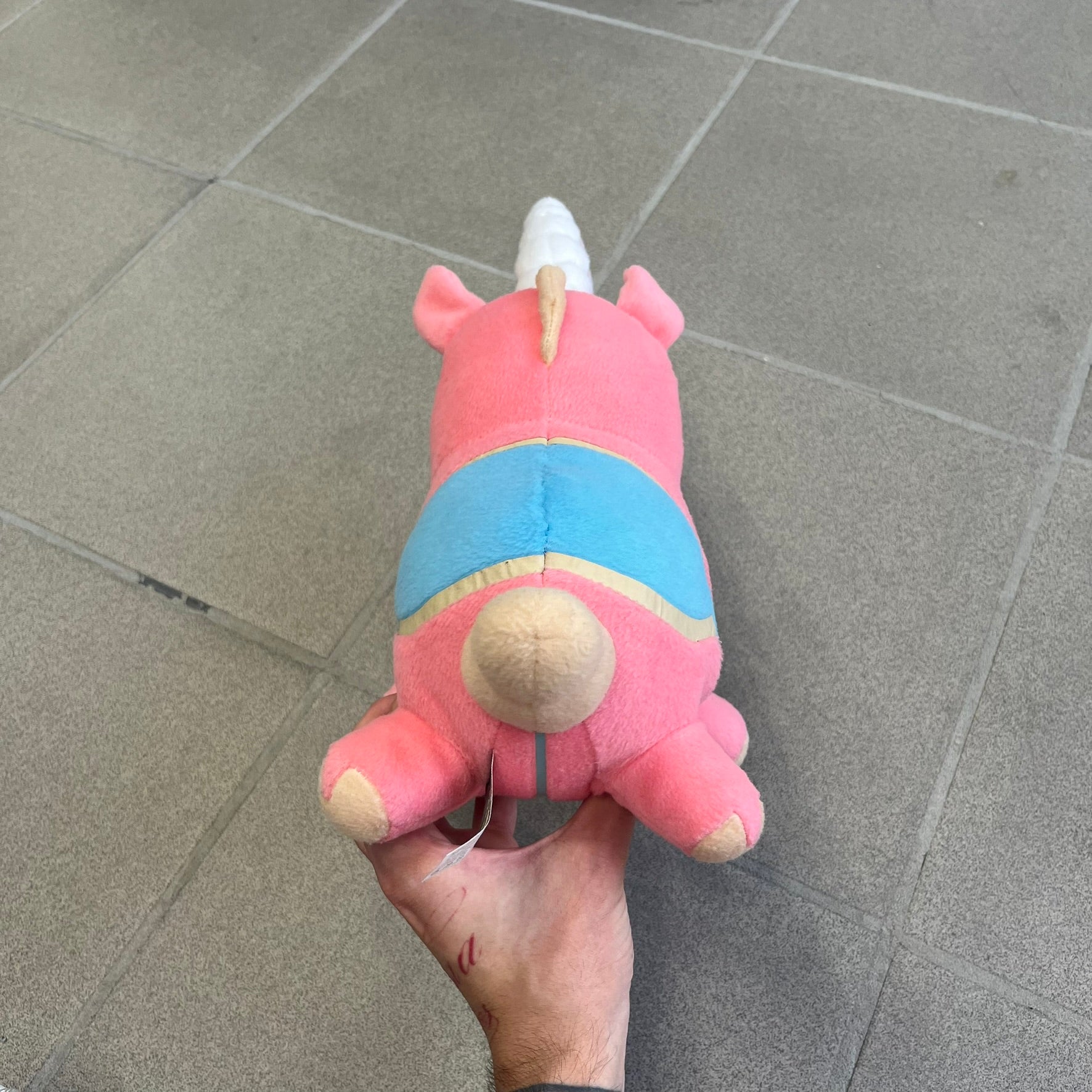 Team Fortress 2 Balloonicorn 2013 Plushie is a pink plush based on the Balloonicorn character from Pyroland, introduced in the 2012 Pyromania update. Released by Valve in 2013 as part of the first series of Valve-themed plush toys, it measures approximately 14.5 inches from horn tip to tail. This plush comes without the original in-game item code.
