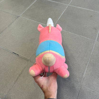 Team Fortress 2 Balloonicorn 2013 Plushie is a pink plush based on the Balloonicorn character from Pyroland, introduced in the 2012 Pyromania update. Released by Valve in 2013 as part of the first series of Valve-themed plush toys, it measures approximately 14.5 inches from horn tip to tail. This plush comes without the original in-game item code.

