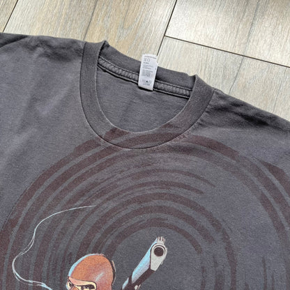 The Team Fortress 2 Red Spy 2010's Gray Tee is an official Valve shirt from the Sniper vs. Spy update, produced during Valve’s Amercian Apparel merch era. This charcoal gray tee features a red Spy character holding a butterfly knife and gun, set against a dark red target graphic with dripping effects. A super rare collectible, it represents one of the original Valve Store releases from over a decade ago.