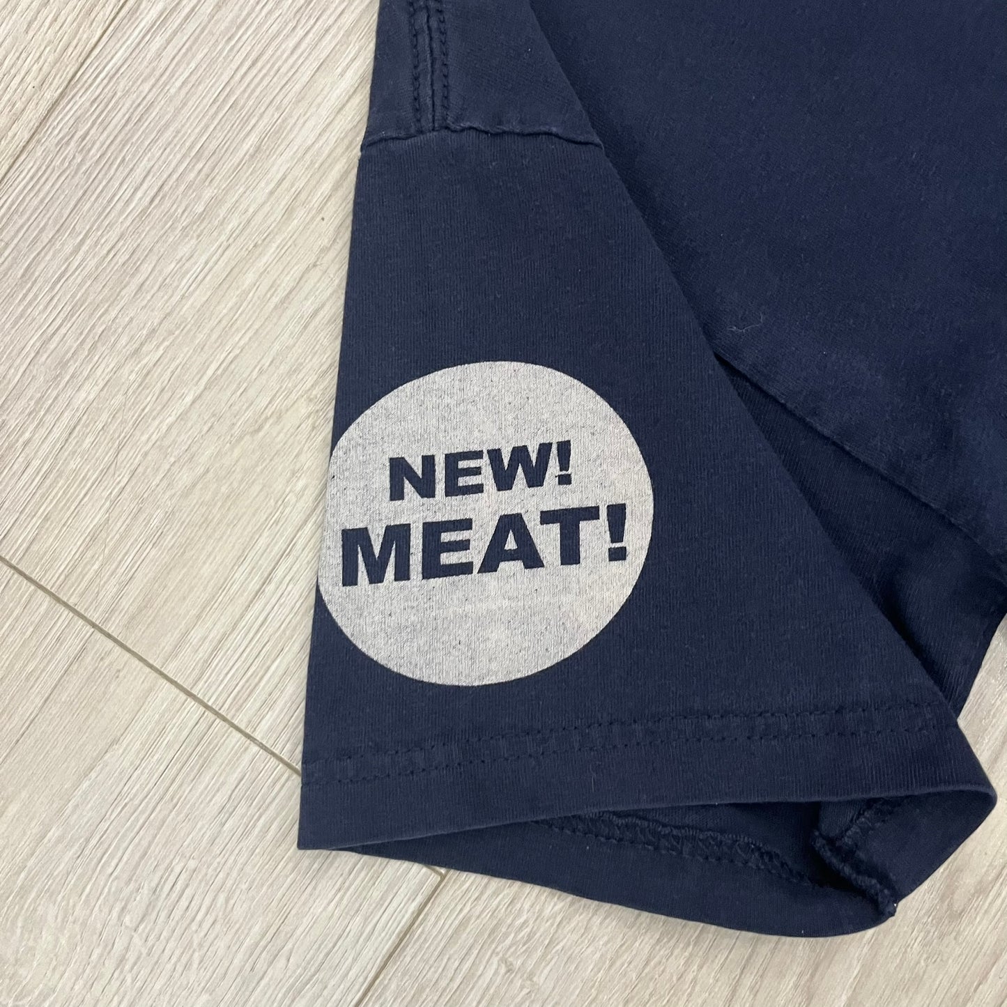 The Team Fortress 2 Sandvich 2010 Tee is an official Valve shirt released in December 2010 and produced during Valve’s in-house merch era. This Navy tee features a Sandvich Edible Device (Heavy secondary weapon) on the front, Sandvich blueprint graphic on the back and 'New Meat!' on the sleeve. A super rare collectible, it represents one of the original Valve Store releases from over a decade ago.