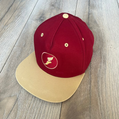 Team Fortress 2 Scout RED LootCrate Hat is a red and yellow cap released with the 2016 LootCrate. The red crown features an embroidered RED Team Scout Hermes Boot logo, while the yellow visor includes a large Team Fortress 2 logo on the underside. The hat combines official game branding with collectible LootCrate exclusivity.&nbsp;