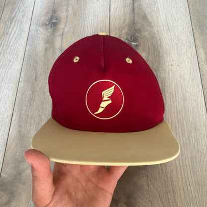 Team Fortress 2 Scout RED LootCrate Hat is a red and yellow cap released with the 2016 LootCrate. The red crown features an embroidered RED Team Scout Hermes Boot logo, while the yellow visor includes a large Team Fortress 2 logo on the underside. The hat combines official game branding with collectible LootCrate exclusivity.&nbsp;