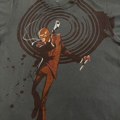The Team Fortress 2 Spy 2009 Tee is an official Valve shirt from the Sniper vs. Spy update, produced during Valve’s in-house merch era before they switched to a different shirt company. This charcoal tee features a red Spy character holding a butterfly knife and gun, set against a dark red target graphic with dripping effects. A super rare collectible, it represents one of the original Valve Store releases from over a decade ago.