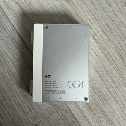 Teenage Engineering YZY 2019 OG Stem Player, an unreleased collaboration between Kanye West and Teenage Engineering. This rare device allows you to isolate stems like vocals, drums, and bass while adding effects such as filters, echo, and distortion. Featuring a sleek, minimalist metal design and ergonomic build, it was first seen during Kanye’s 2019 Sunday Service era and came paired with exclusive extended versions of “Jesus Is King.” Fully compatible with headphones and speakers, it remains a sought-afte