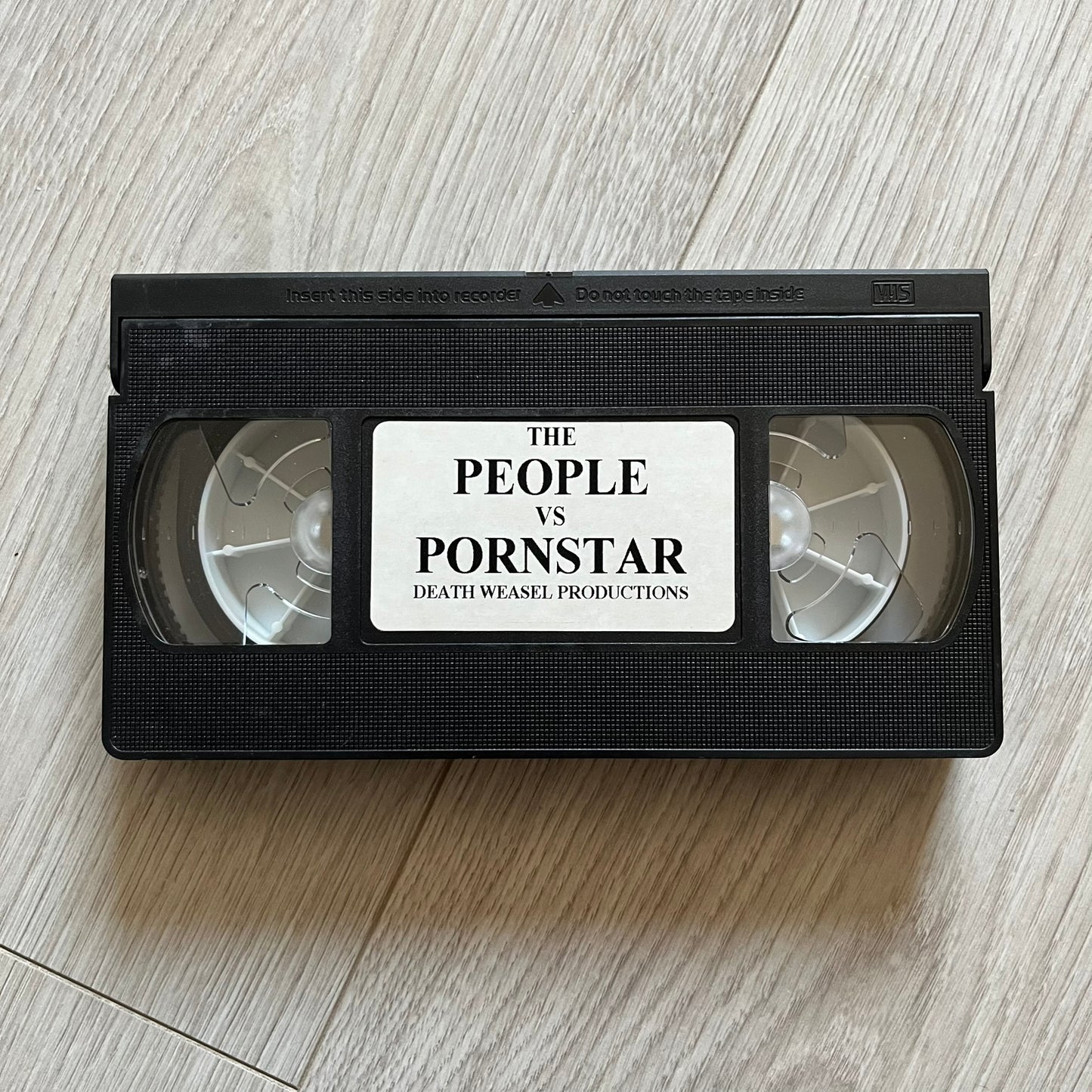 The People Vs. Porn Star is a 22-minute VHS video released in 2000 by Porn Star Skateboards in the United States. The tape features a mix of skate footage, live concert clips with featured artists, staged vignettes, and an on-camera segment with Sean “Vader” Murphy discussing the media attention surrounding the brand at the time. Original cover art includes the subtitle text “Not a Porn flick despite effort made and footage obtained” printed along the bottom.