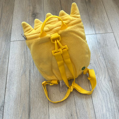The Simpsons 1990's Bart Simpson Head Backpack is a novelty backpack shaped like a 3D Bart Simpson head. The design is fully yellow with soft sculpted facial features including eyes and nose, a molded mouth, and protruding hair. It includes yellow shoulder straps and a single main compartment.