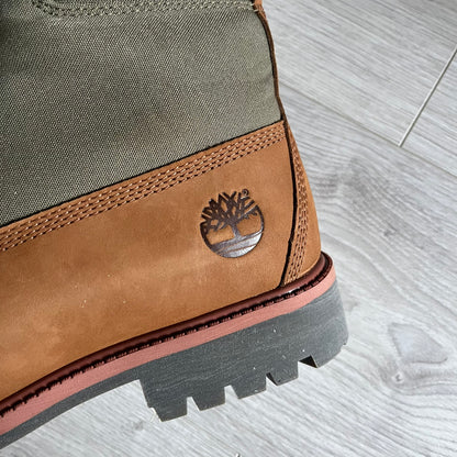 Timberland Heritage 6-Inch Waterproof Boots in brown and khaki. Built for warmth, durability, and everyday wear with waterproof premium leather, PrimaLoft® insulation, and TimberDry™ waterproof technology. Includes a cushioned anti-fatigue footbed, padded collar, and steel shank for superior comfort and support. A timeless essential made for all conditions.