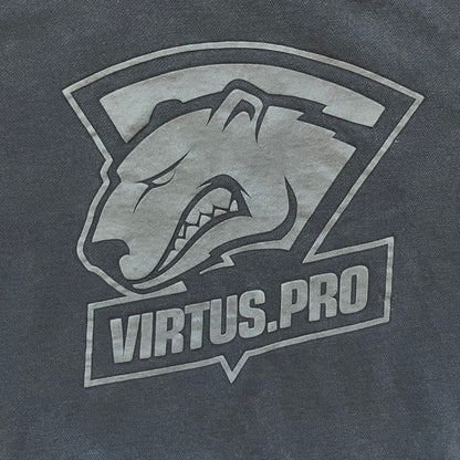 Virtus Pro 2020s Washed Black Hoodie is a black pullover hoodie featuring the Virtus.Pro logo on the front. Made from soft, high-quality materials, it offers a comfortable fit with durability suitable for casual wear or gaming. This hoodie was released in the 2020s as official Virtus.Pro esports merchandise.