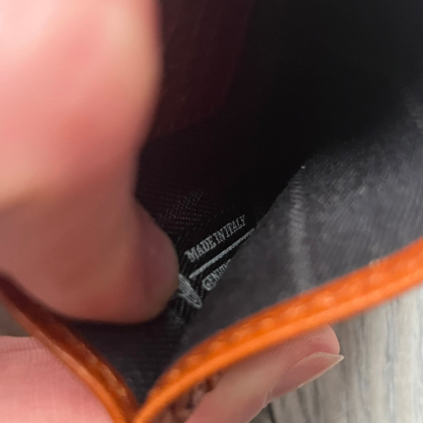 Vivienne Westwood Brown Flat Card Holder is crafted from buffed leather in a camel brown tone with logo hardware at the front. It features four card slots, a central note compartment, black twill lining, and an interior leather Vivienne Westwood tab with a material tag. Made in Italy, the card holder comes with the original box and tags. 252314M163098