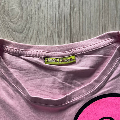Baby pink 2013 Wacky Races women’s tee with Penelope Pitstop and her iconic "The Compact Pussycat" car. Glittery pink accents on her helmet, skirt, umbrella with white “Penelope Pitstop!” text. Officially Hanna-Barbera licensed.