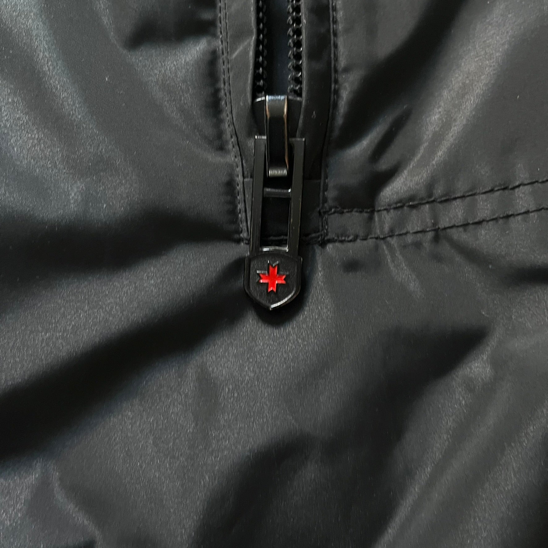The Wellensteyn Mercury Black Winter Jacket combines premium function with tailored elegance. Crafted from TiSaAirTec fabric, it offers a smooth, matte finish that is waterproof, windproof, and built for temperatures from 0 to -20 °C. Features include a removable inner jacket with a high knit collar, multiple secure pockets, back vents, and a quilted lining for warmth. A signature of German engineering and timeless outerwear design.