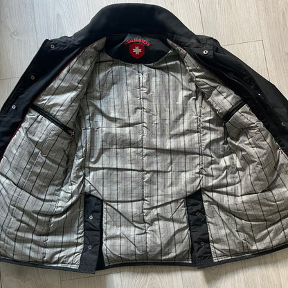 The Wellensteyn Mercury Black Winter Jacket combines premium function with tailored elegance. Crafted from TiSaAirTec fabric, it offers a smooth, matte finish that is waterproof, windproof, and built for temperatures from 0 to -20 °C. Features include a removable inner jacket with a high knit collar, multiple secure pockets, back vents, and a quilted lining for warmth. A signature of German engineering and timeless outerwear design.