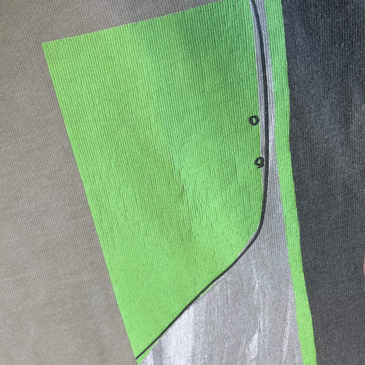 Longsleeve tee from the FW18 Yeezy x Pornhub collection, released 09/07/2018. Vapor color, featuring a front illustration of painted Mia Malkova with her name above and “Hottest Female Ass” below. Back has the numbers “6918” (futuristic theme set in the year 6918). Includes printed Pornhub tag and YEEZY wash tag, part of a limited run commemorating the 2018 Pornhub Awards.