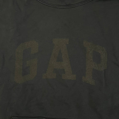 Yeezy GAP Engineered by Balenciaga Dove Hoodie in washed black, produced as part of the three-way Yeezy, GAP, and Balenciaga collaboration. Features a boxy, oversized fit with a slightly darker oversized GAP logo printed on the front and a large white dove graphic on the back. Each hoodie shows natural variation in wash, tone, and texture, consistent with the production process used for this release, from LosAngelesArchive.
