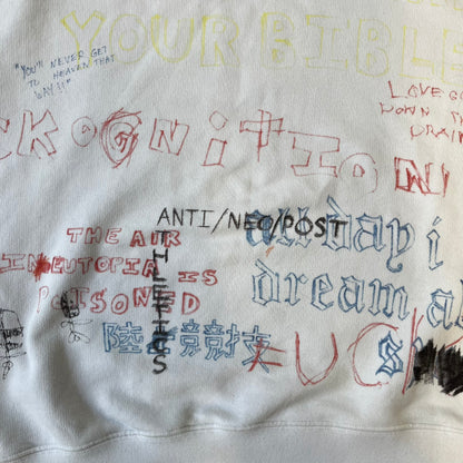 Yeezy Season 5 Scribbled Adidas Crewneck by ERD features an oversized, boxy silhouette in the Arctic colorway. The 100% cotton Adidas crewneck has handwritten-style printed graphics and phrases across the garment, including a embroidered Adidas Three Stripes logo on the chest. It was made in Italy and designed by Henri Alexander Levy from Enfants Riches Déprimés.