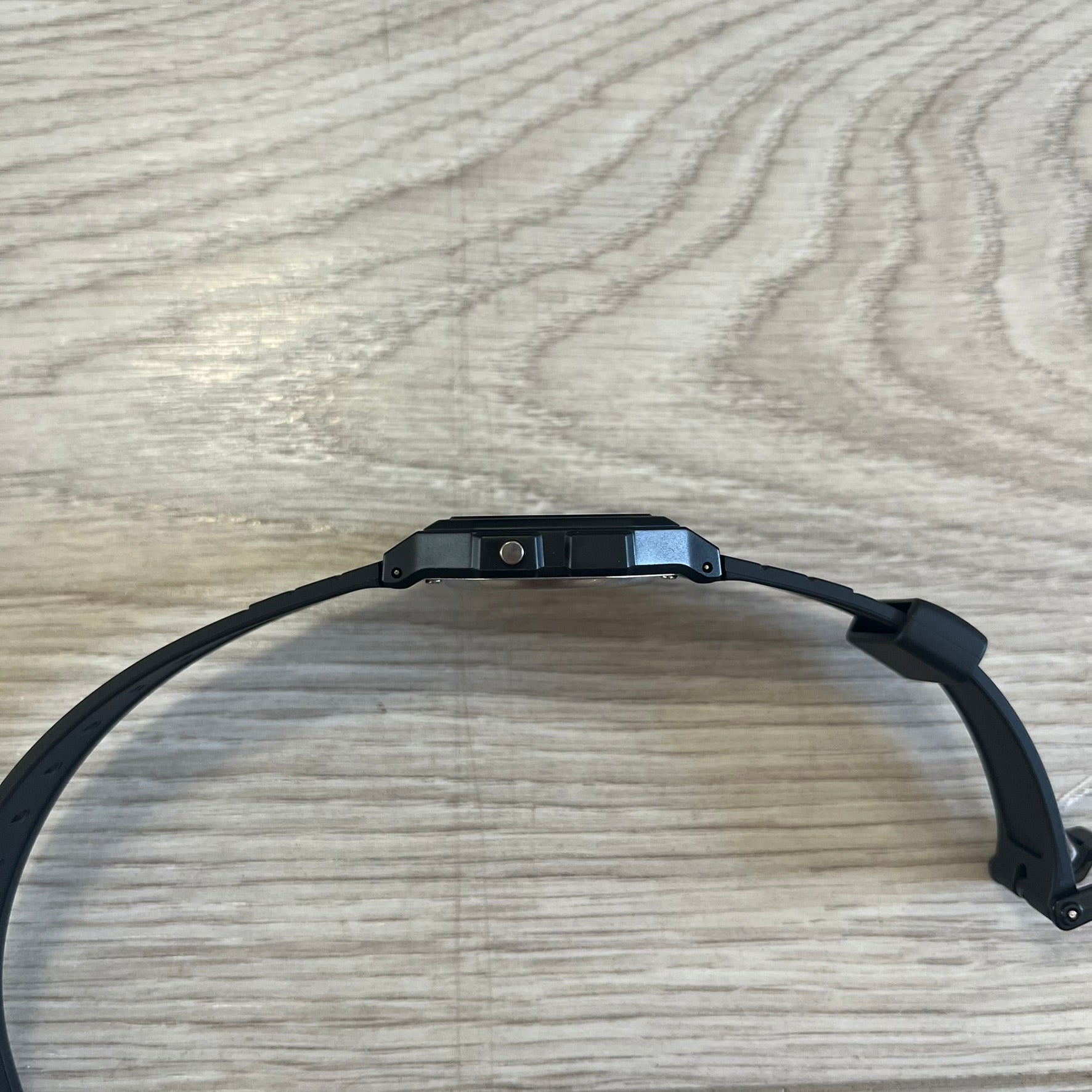 Black headband on a wooden surface