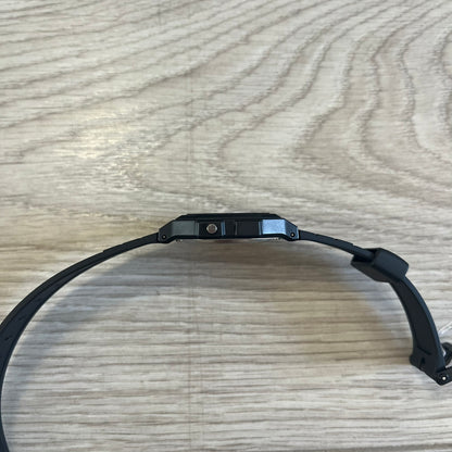 Black headband on a wooden surface
