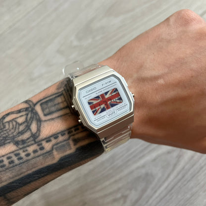Casio watch with British flag design on a wrist with tattoos