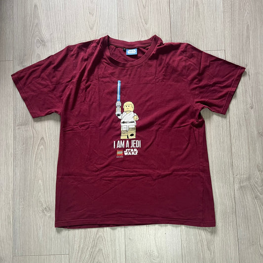 Maroon t-shirt with 'I Am a Jedi' graphic on a wooden surface