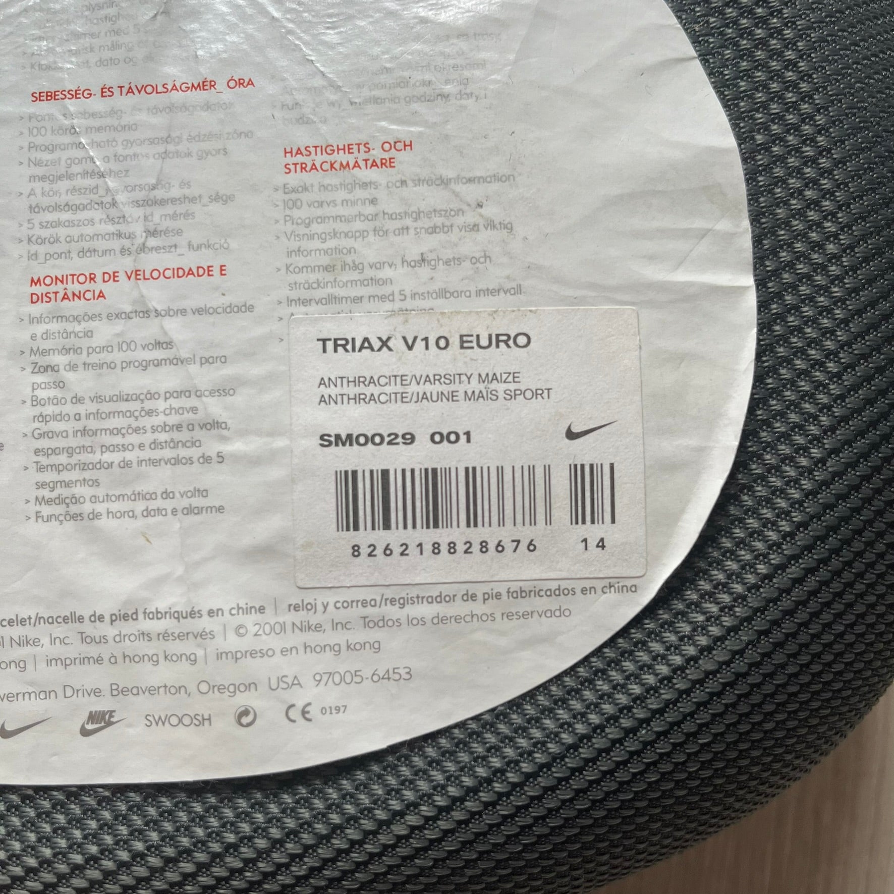 Close-up of a Nike Triax V10 Euro label on a shoe.