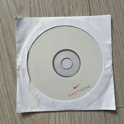 Nike Timing CD on a white paper background