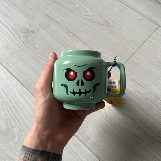 small lego green skeleton ceramic mug