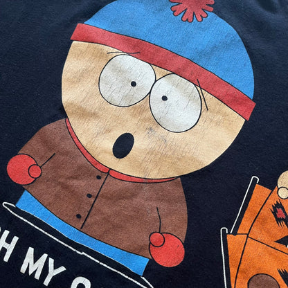 Cartoon character with a blue hat and brown coat on a dark background