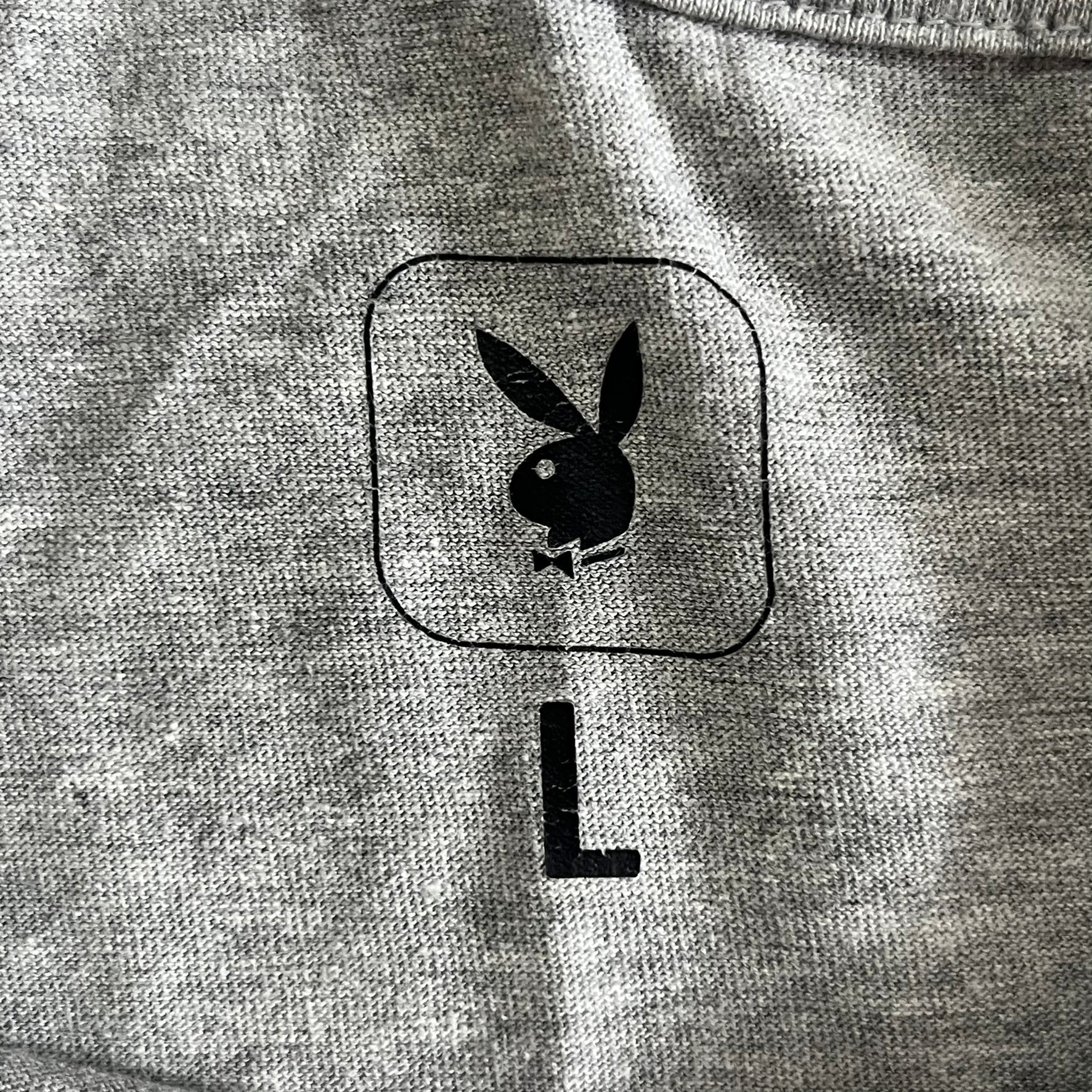 Gray sweatshirt with a black logo on a gray background