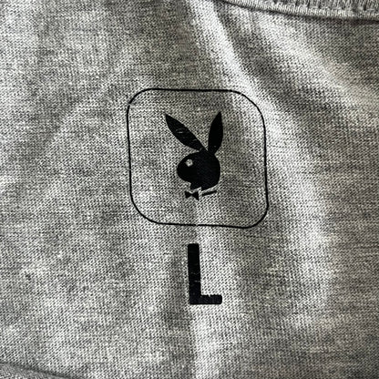 Gray sweatshirt with a black logo on a gray background