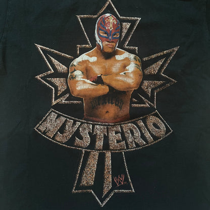 Black t-shirt with a wrestler graphic and 'Mysterio' text on a dark background