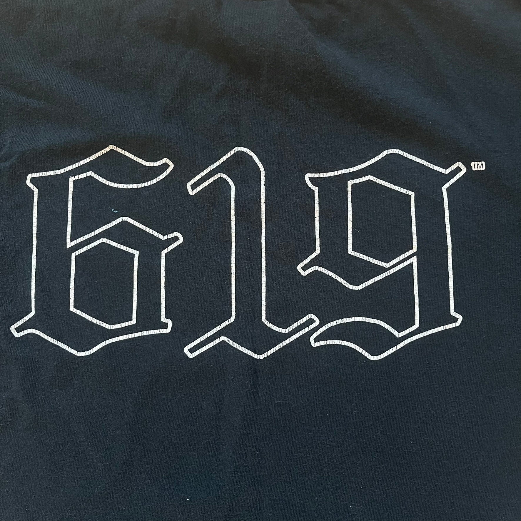 White '619' logo on a black background